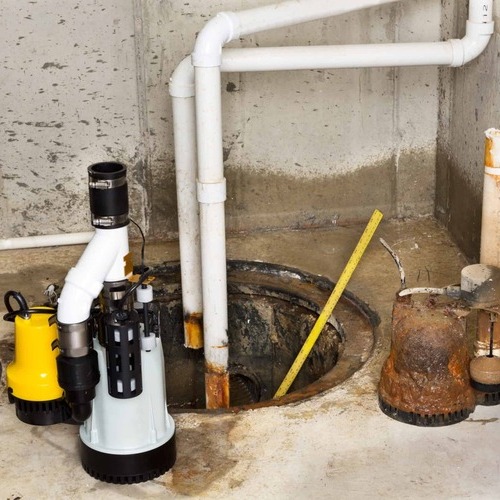 sewage ejector pump in a basement